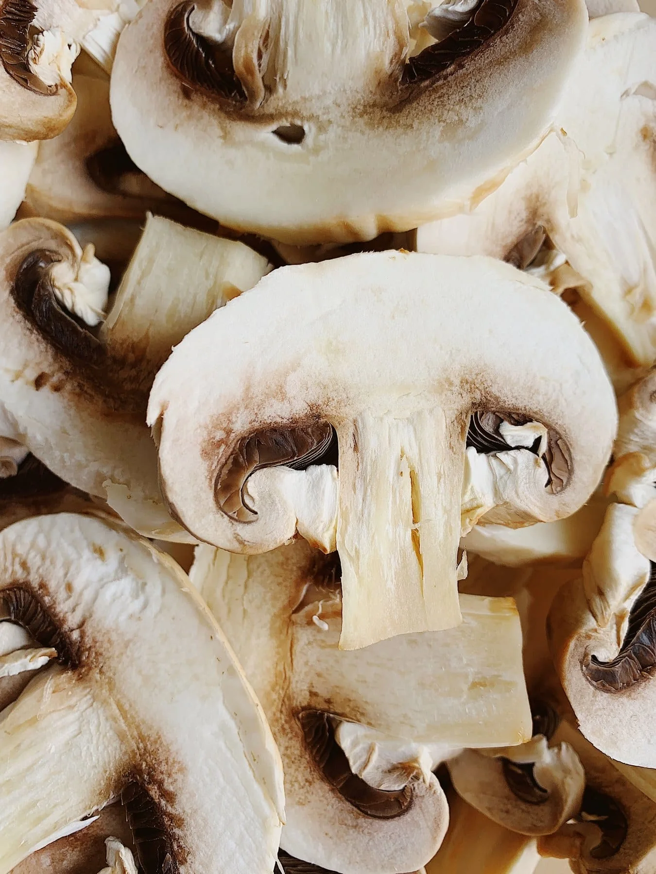 Sliced and whole mushrooms