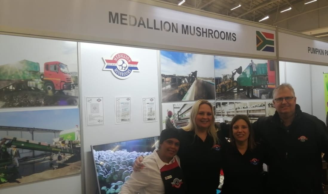 Medallion Mushrooms sales team at a trade exhibition